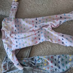 2 Primary Rainbow Heart Footie Pajamas